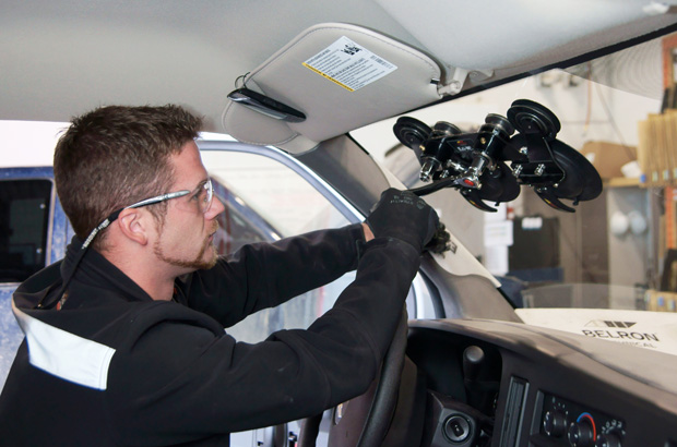 A Senior Mechanical Engineer Working With A Speedy Glass In An Automobile Manufacturing Industry.